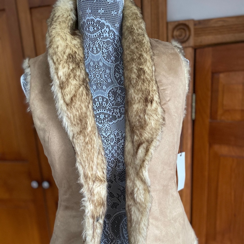 NWOT reversible fur vest